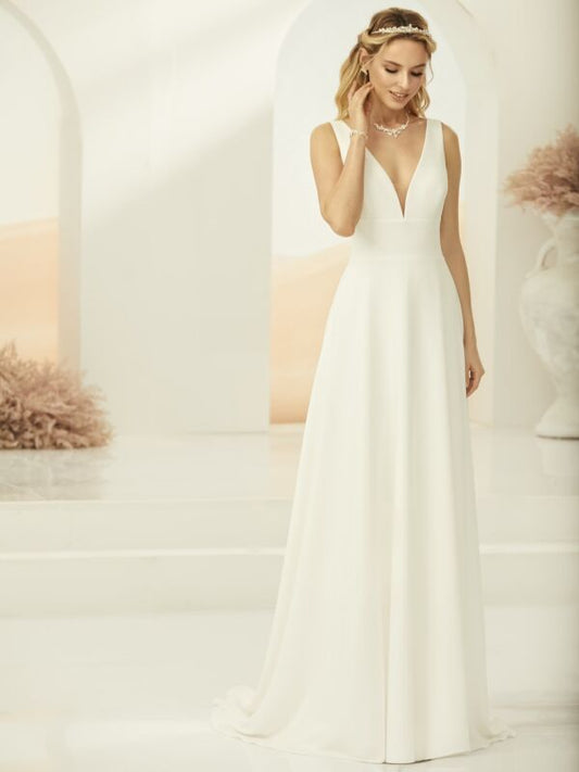 A-line wedding dress  made from high-quality georgette  deep V-neckline, front and back  soft tulle inserts on the bodice for discrete coverage  discrete back-zip fastening  4 cm seam allowance  carefully designed and manufactured in Europe